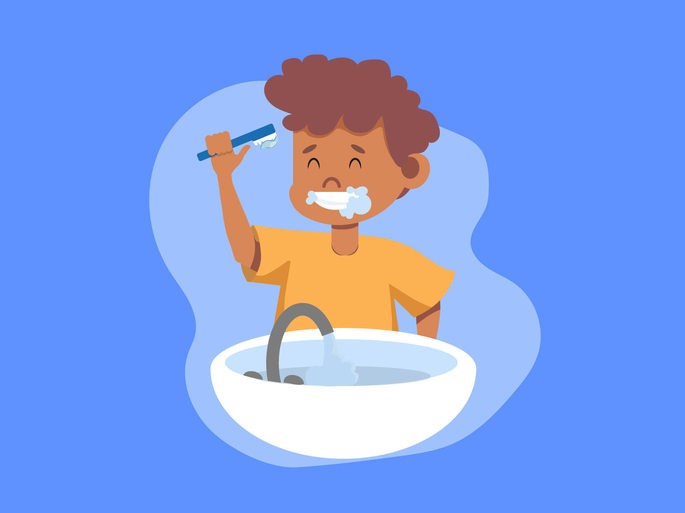 Niño cepillándose los dientes