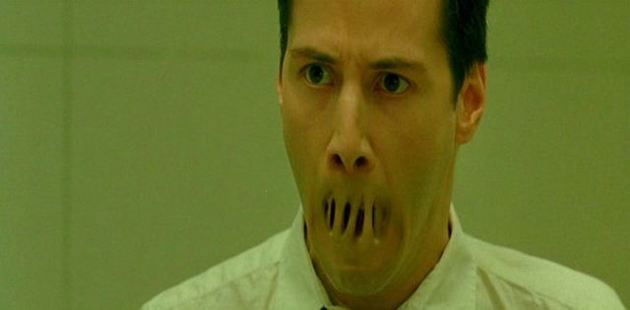 Neo es capturado por los agentes.