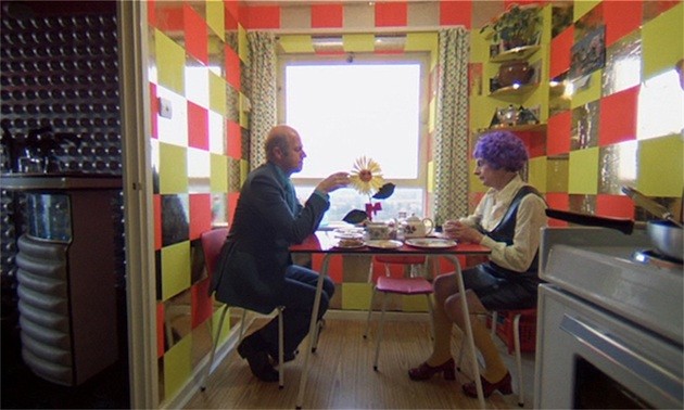 Pais de Alex na cozinha