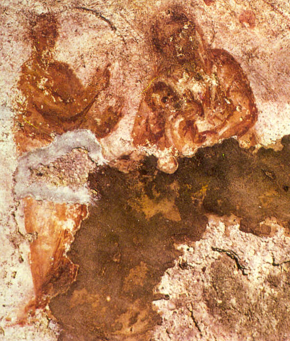 arte cristã primitiva exibindo imagem de maria e menino jesus em catacumba