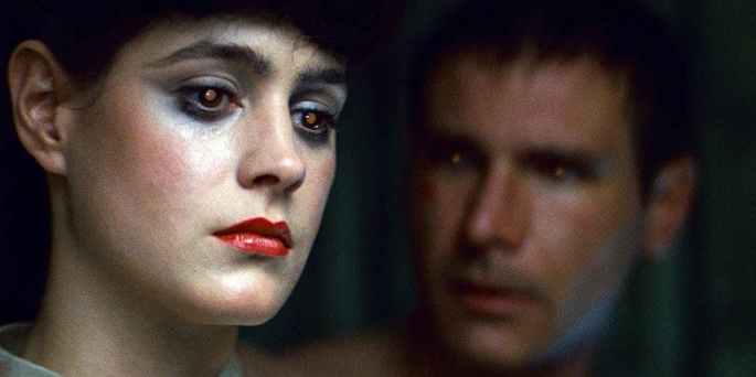 Deckard e Rachel em close exbindo os olhos com pupilas brilhantes